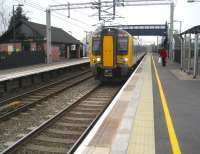 350110 enters Tile Hill station on 24 March 2007 on a stopping <br>
service to Northampton.<br>
<br><br>[John McIntyre 24/03/2007]