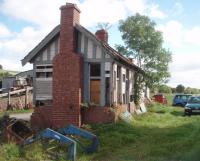 The station building at Moniaive really looks as though the next gust of wind will reduce it to rubble and matchwood. Having last seen a train over 60 years ago its a remarkable survivor but surely cannot be around for too much longer.<br><br>[Mark Bartlett 17/09/2010]