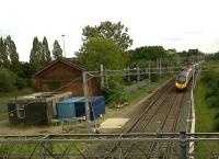 This former WCML station is just behind Watford Gap services on the M1. The modern, fast, large, and well maintained Pendo contrasts first with the small and slow track inspection carts, and secondly with the old-fashioned and distinctly under-maintained goods shed. With gaps in the roof and a tree growing out one window, it just doesn't look loved.<br><br>[Ken Strachan 17/09/2010]