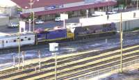 The <I>Indian Pacific</I>, with helper in support, stands at Broken Hill station, New South Wales, 1,750 miles out of Perth on 26 September 2008 during a servicing stop. Just another 700 mile hop to Sydney.<br><br>[Colin Miller 26/09/2008]