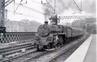 73064 leaves Platform 12 at Glasgow Central with a Gourock semi-fast in February 1967.<br><br>[Colin Miller /02/1967]