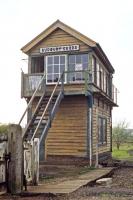 The poster in the signal box window says 'Support local rail services. Use it, don't lose it!' The townsfolk of Sudbury, Suffolk, did and didn't. However, the box was abolished in early 1981 three years after this photo, from which time the train crews could no longer look forward to the kettle being on for them as they approached the Sudbury terminus.<br><br>[Mark Dufton 06/05/1978]