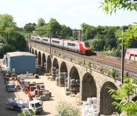 The 08.20 Birmingham New Street - Edinburgh Waverley Virgin Voyager photographed crossing Slateford Viaduct on 3 June 2010.<br><br>[John Furnevel 03/06/2010]