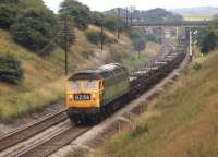 1730 up steel slabs between Foxlow Junction signalbox (background) and Barrow Hill on 19 July 1971.<br><br>[Bill Jamieson 19/07/1971]