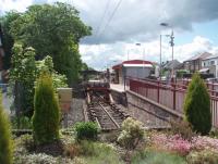 Quiet interlude between trains at Balloch.  This view, taken from the former level crossing, looks south along the branch. The line, and overhead wires of course, once continued over the level crossing to the original Balloch station and then on to the Pier station.<br><br>[Mark Bartlett 26/05/2010]