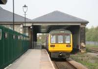 A Saltburn - Bishop Auckland DMU leaves Darlington North Road in April 2009. The buildings to the left of the green fence now form part of the Railway Museum. <br><br>[John Furnevel 24/04/2009]