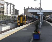 Platform 0 was constructed to allow locals to originate from Haymarket during the year-long work at Waverley in 2006.  Since then it is used as stabling for Haymarket depot, though it has seen ad hoc workings during service disruptions.  At present it is in regular Saturday use for Fife locals, unable to use Waverley because of the closure of Haymarket North Tunnel for electrification work.  There are also platform zeros at King's Cross and Cardiff Central, though at humbler Anniesland, when a new platform was constructed which was 'before' Platform 1 it was numbered 3.  158712 stands with a Cowdenbeath service on 2 October.  <br><br>[David Panton 02/10/2010]