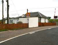 View east towards the level crossing at Auchengray, on the former Caledonian route between Edinburgh and Carstairs, in the summer of 2007. <br><br>[John Furnevel 28/06/2007]