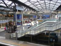 It's only four years since the major works at Waverley, but I already find it hard to remember what the north-western part of the station looked like previously. I can though say with confidence that this view, taken on 29 September, would not have been possible. It is taken from the top of the steps leading to the new platforms 1 & 20 which simply weren't there before, though they are now indispensable. <br>
<br><br>[David Panton 29/09/2010]