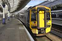 158719 waits at platform 7S at Aberdeen on 4 September with the well patronised 11.59 to Inverness.<br>
<br><br>[Bill Roberton 04/09/2010]