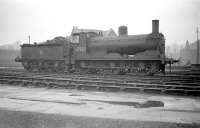 Drummond 0-6-0 no 57232 stands in the yard at Stirling South on 27 December 1959. Withdrawn from here in May 1961 the locomotive was cut up at Inverurie works a year later. <br><br>[Robin Barbour Collection (Courtesy Bruce McCartney) 27/12/1959]