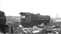 The remains of standard class 4MT 4-6-0 no 75062 in the course of being broken up in the yard of T W Ward, Inverkeithing, on 27 May 1968, having been withdrawn from Carnforth shed at the end of February that year. [With thanks to Messrs Stockton, McRae, Bathgate, Poustie & McIntosh]  <br>
<br><br>[Bill Jamieson 27/05/1968]