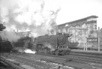 Britannia Pacific no 70039 <I>Sir Christopher Wren</I> about to take the 9am Perth - Euston train out of Carlisle on 30 January 1965.<br><br>[K A Gray 30/01/1965]