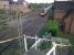 The former village station of Bulkington lies South of Nuneaton and East of Bedworth. The station building is fine, the steps from the road bridge are fine, but I'm not convinced that the LNWR used white painted scaffolding poles as handrails...notice the new flats for trainspotters on the left. View looks South.<br><br>[Ken Strachan 10/08/2010]