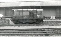 08718 stands alongside the former goods depot on the south side of Waverley station in the late 1970s. The area is now occupied by car parks and the Edinburgh Council headquarters. [See image 9504]<br><br>[Ken Browne //]