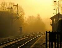 Dawn breaks over Brundall station, Norfolk, in February 2010. The line to the left is for Great Yarmouth and to the right for Lowestoft.<br><br>[Ian Dinmore 06/02/2010]