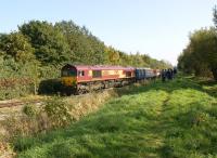 The Branch Line Society <I>Ribble Lune Railtour</I> of 10 October 2010 runs aongside Preston Docks, with the docks to the left of 66066 and the River Ribble on the right. On the rear of the train at this stage was Deltic 55022.<br>
<br><br>[John McIntyre 10/10/2010]