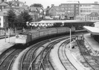 In the absence of visible passengers, there's a dream-like quality to this Class 33 leaving Newport in 1987, probably with a Crewe-Cardiff service. I was well aware that loco' haulage was on its way out, and photographed whatever I could - especially as my parents had just moved in with me!<br><br>[Ken Strachan //1987]