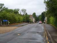 Former rail under-bridge in Great Houghton, on the line from Northampton to Bedford, with directions to the trackbed, now a foot & cycle path to Northampton.<br><br>[David Pesterfield 04/08/2010]