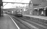 An EM1 electric locomotive runs west through Dinting towards Manchester in May 1969 with a Woodhead route freight.<br><br>[K A Gray /05/1969]