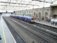 A First TransPennine service from Manchester Airport forming the 15.47 to Glasgow Central arrives at Carlisle platform 3 on 18 October 2010.<br><br>[Ken Browne 18/10/2010]