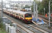 A Helensburgh train starts its journey west from Airdrie on 12 October 2010.<br><br>[John Furnevel 12/10/2010]