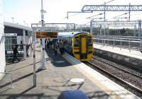 The 10.48 Waverley - Bathgate shortly after arrival at the new station on 20 October 2010 [see image 31158].<br><br>[John Furnevel 20/10/2010]