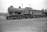 Maunsell class D1 4-4-0 no 31246 stands at the head of the stored locomotive line at Feltham on 5 October 1959.<br><br>[Robin Barbour Collection (Courtesy Bruce McCartney) 05/10/1959]