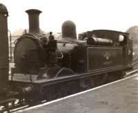 Adams O2 class 0-4-4T no 29 <I>Alverstone</I> standing at what is thought to be Cowes Station on the Isle of Wight on 7 December 1962.<br><br>[David Pesterfield 07/12/1962]