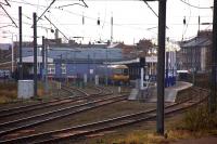 A view of King's Lynn station from the East Yard sidings on 24 February 2010 with a service for London Kings Cross standing at platform 1.<br><br>[Ian Dinmore 24/02/2010]