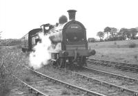 57581 pictured with the Glasgow South Railtour at RNAD Giffen on 9 June 1964 after running round in the exchange sidings.<br><br>[K A Gray 09/06/1964]