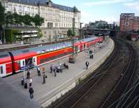 Despite it being the start of the evening rush hour just a handful of passengers wait for the train on one of the outdoor platforms at Hamburg on 27 July 2010.<br><br>[John Steven 27/07/2010]