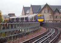 An Aberdeen - Glasgow Queen Street service rolls across the Tay viaduct on a wet and windy 22 October 2010 on the approach to Perth station, where it is scheduled to arrive at 14.11.<br><br>[Andrew Wilson 22/10/2010]