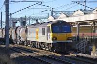 The famed (not-so) 'silver bullets' Dollands Moor - Irvine china clay tanks (which originate in Antwerp) passing through Carnforth on 20 Octoberbehind92012 <I>Thomas Hardy</I>.<br>
<br><br>[Bill Roberton 20/10/2010]