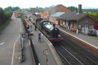 Churchward ex-GWR 2-8-0 no 3850 with a train at Bishops Lydeard on the West Somerset Railway on 31 May 2010.<br><br>[Neville Davies 31/05/2010]