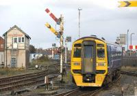 158815 leaves Blackpool North on 19 October, passing some of the semaphore signals which will be replaced when the line is electrified.<br>
<br><br>[Bill Roberton 19/10/2010]