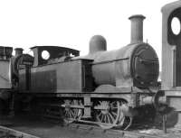 Johnson 'half-cab' 1F 0-6-0T no 41708 stands amongst the locomotives in the yard outside 41D Canklow Shed on 13 March 1966.<br><br>[David Pesterfield 13/03/1966]