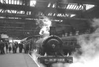 Jones goods no 103 stops at Perth on the way south following participation in the Highland Railway centenary celebrations at Inverness in August 1965. The sleeping car standing on the right will be part of the London - Glasgow Central - Perth <I>'Night Limited'</I>, which ran between 1964 and 1987. <br><br>[K A Gray 30/08/1965]