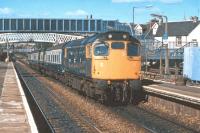 Locomotive 27 054 prepares to pull away from Dunblane with a Saturday afternoon Perth - Glasgow Queen Street working in September 1986. At the time, this was one of the last regular passenger workings with Class 27 haulage.<br><br>[Mark Dufton /09/1986]