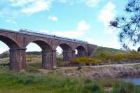 The 12.15 Southern Cross to Bendigo, <I>'Vlocity'</I> DMU on the Malmsbury Viaduct. The viaduct was about to have its 150th Birthday Party, arranged by the local townspeople.<br><br>[Colin Miller 11/10/2010]