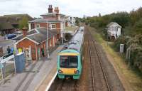 An Ashford to Brighton service waits at Rye to pass an Ashford bound train on 26 October 2010. It was a longer than usual wait as, on this occasion, the Ashford train was running 20 minutes late.<br>
<br><br>[John McIntyre 26/10/2010]