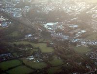 Aerial view of St Blazey with the depot and sidings at top left. The line to Newquay runs to the bottom right. The line replaced an earlier canal which can still be traced.<br><br>[Ewan Crawford 27/10/2010]