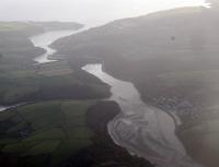 There are many photographs of the line approaching Fowey over the causeway at Golant. Here's another but from an unusual viewpoint. The loading point at Fowey can be seen at the top left of centre.<br><br>[Ewan Crawford 27/10/2010]