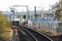 Looking east from Bathgate (Old) to the new station from the end of the platform. A number of track panels have been lifted. A train sits in the train maintenance depot (right) neighbouring the new station site (left).<br><br>[Ewan Crawford 31/10/2010]