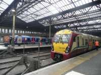 Class 334s at 1055 on the 29th of October in Platform 17 at Edinburgh Waverley.<br><br>[John Yellowlees 29/10/2010]