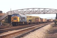 A Peak takes the Pengham FLT to Portobello FLT containers from fast to slow line at Tapton Jct, just north of Chesterfield, on 20 July 1971. The train is heading for Rotherham via Barrow Hill, avoiding Sheffield Midland station.<br><br>[Bill Jamieson 20/07/1971]