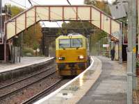 A Network Rail MPV working a Railhead Treatment Train heading South through Johnstone on 27th October 2010. These trains are kept busy during leaf fall season, and can continue to do so through to mid to late December, depending on weather conditions<br><br>[Graham Morgan 27/10/2010]