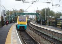 The sharply curved platforms 4 and 5 at Earlestown were refurbished in 2010. They lie some distance away from the other platforms at this triangular junction, on a link built by the Grand Junction in 1837, and are used by North Wales - Manchester services such as the one shown here with Arriva Trains Wales unit 175114.<br><br>[Mark Bartlett 04/11/2010]