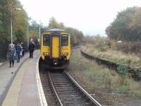 The platforms on the west to south curve at Earlestown were closed for some time but one was reopened for a new, hourly, Liverpool Lime Street to Warrington Bank Quay service. Contrary to the destination blind 156488 is heading for Bank Quay in this view looking towards the south junction. The 156 squealed a little on the check railed curve, but this was nothing compared to the screeching Pacer that preceded it. This picture was taken standing behind the original station building [See image 31357]. Platforms 4 and 5 on the south to east curve are behind the trees on the left - image 31358.<br><br>[Mark Bartlett 04/11/2010]