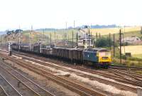 An unidentified class 47 heads a down inter-regional mixed freight past a forest of semaphore signals at Barrow Hill on the Midland Railway's 'Old Road' from Chesterfield to Rotherham in the summer of 1971.<br><br>[Bill Jamieson 19/07/1971]